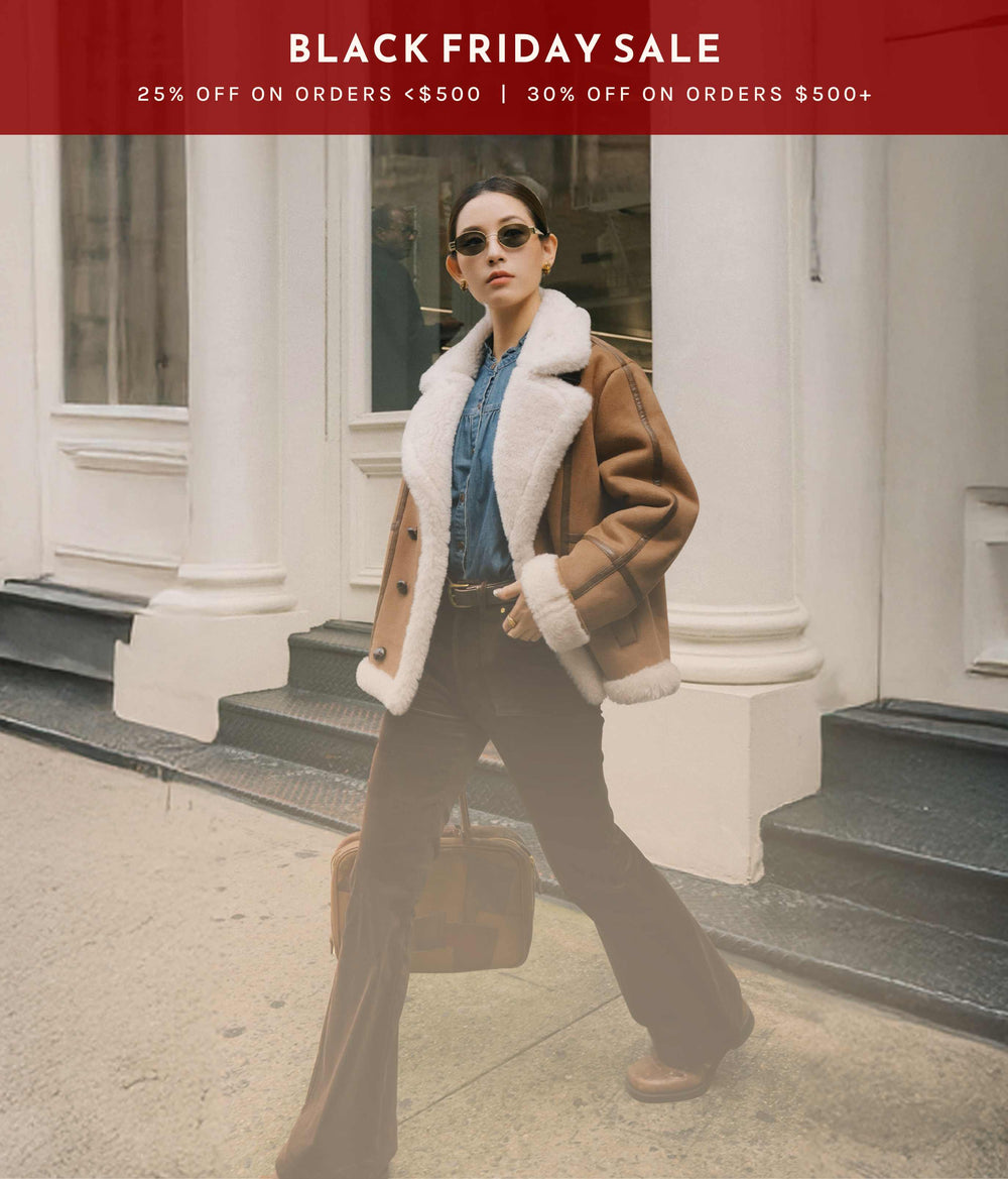 Model advertising Petite Studio's Black Friday Sale in New York